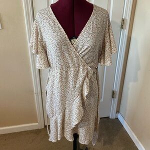 BUY ONE GET ONE FREE

Floral Wrap Dress